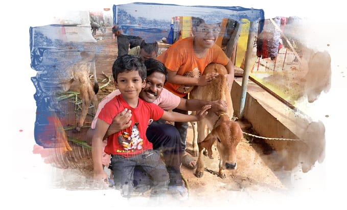 Children and volunteers of GoPals with a desi calf.